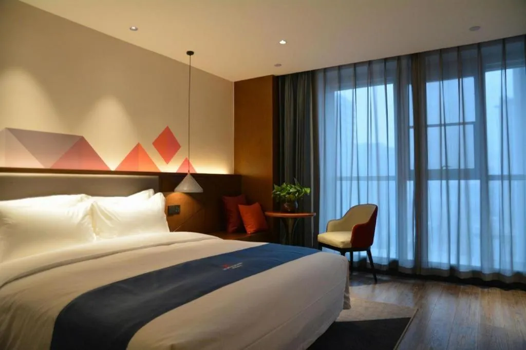 Bed in Borrman Hotel Ji'nan Aoti Center East Provincial Hospital