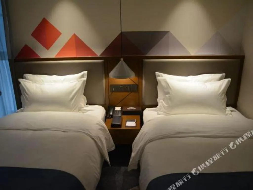 Bed in Borrman Hotel Ji'nan Aoti Center East Provincial Hospital