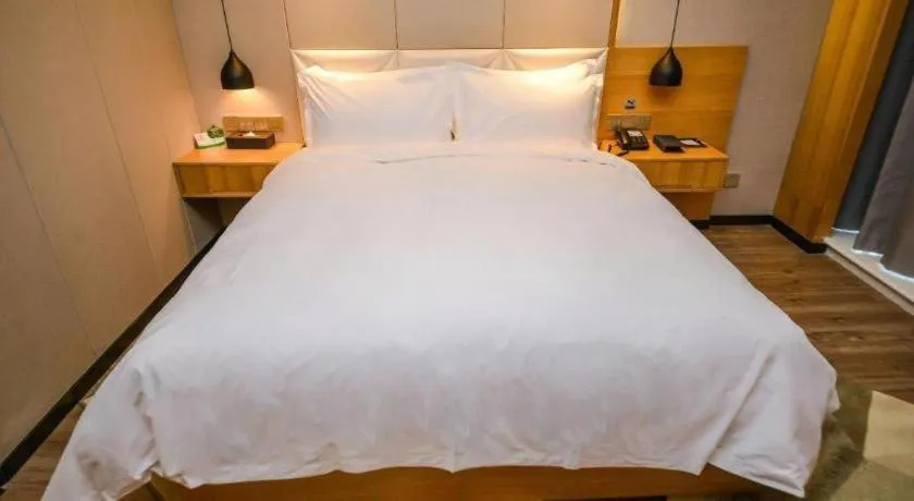 Bed in Borrman Hotel Ji'nan Aoti Center East Provincial Hospital