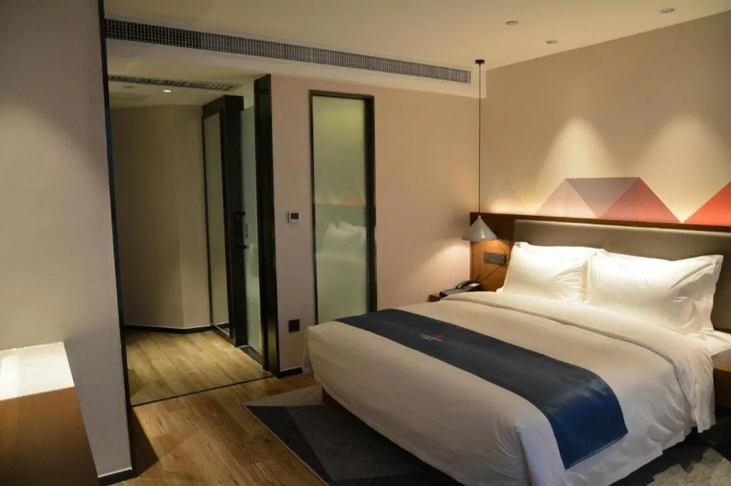 Bed in Borrman Hotel Ji'nan Aoti Center East Provincial Hospital