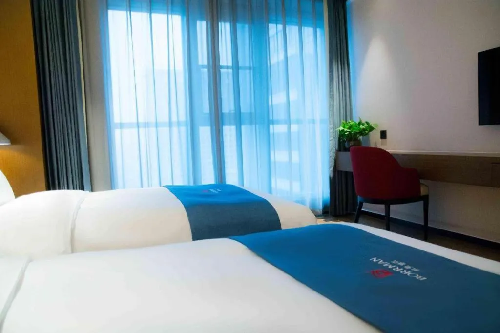 Bed in Borrman Hotel Ji'nan Aoti Center East Provincial Hospital
