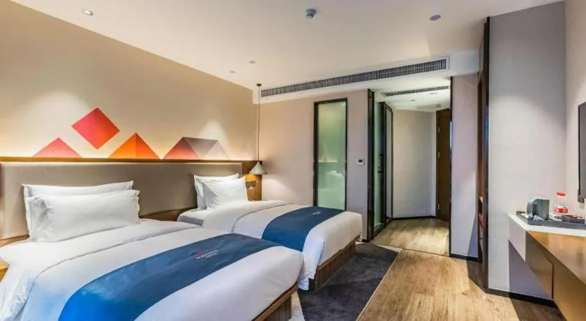 Bed in Borrman Hotel Ji'nan Aoti Center East Provincial Hospital