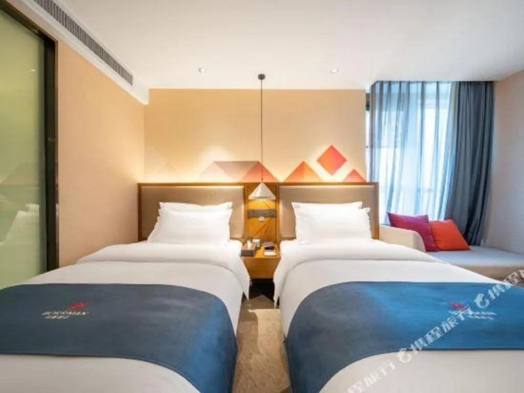 Bed in Borrman Hotel Ji'nan Aoti Center East Provincial Hospital