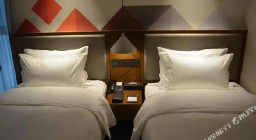 Bed in Borrman Hotel Ji'nan Aoti Center East Provincial Hospital