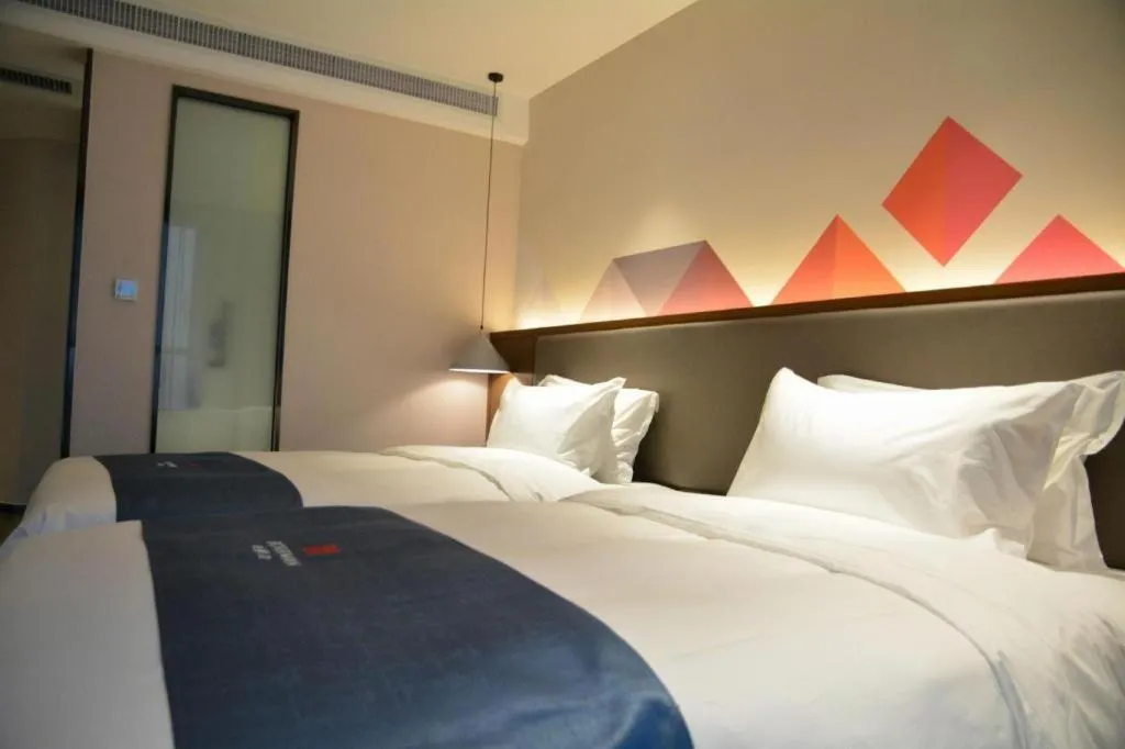 Bed in Borrman Hotel Ji'nan Aoti Center East Provincial Hospital