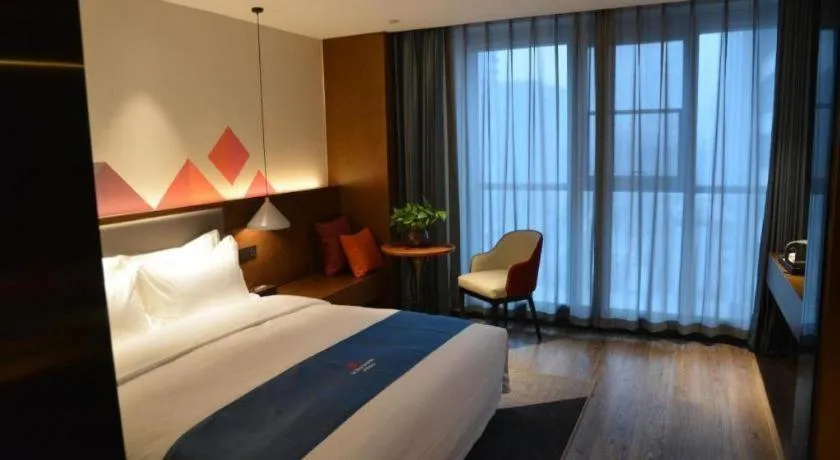 Bed in Borrman Hotel Ji'nan Aoti Center East Provincial Hospital