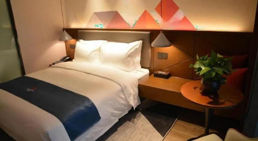 Bed in Borrman Hotel Ji'nan Aoti Center East Provincial Hospital