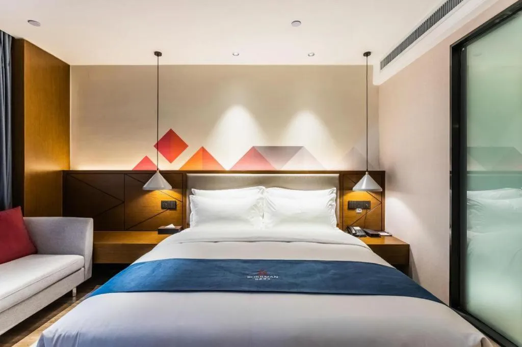 Bed in Borrman Hotel Ji'nan Aoti Center East Provincial Hospital