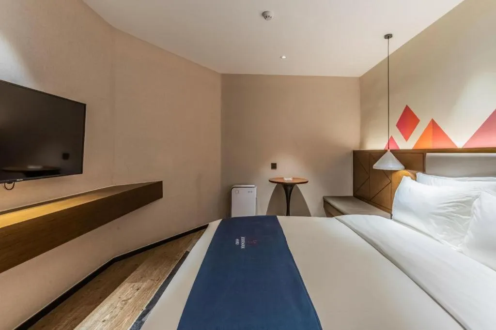 Bed in Borrman Hotel Ji'nan Aoti Center East Provincial Hospital