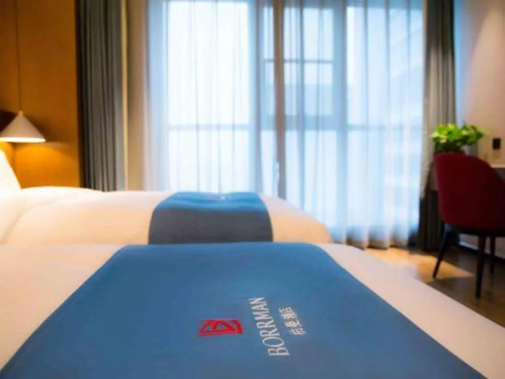 Bed in Borrman Hotel Ji'nan Aoti Center East Provincial Hospital