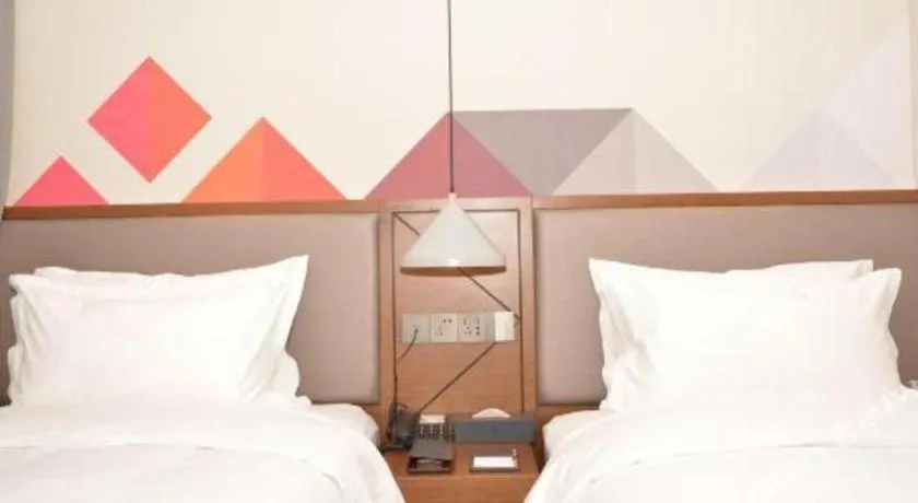 Bed in Borrman Hotel Ji'nan Aoti Center East Provincial Hospital