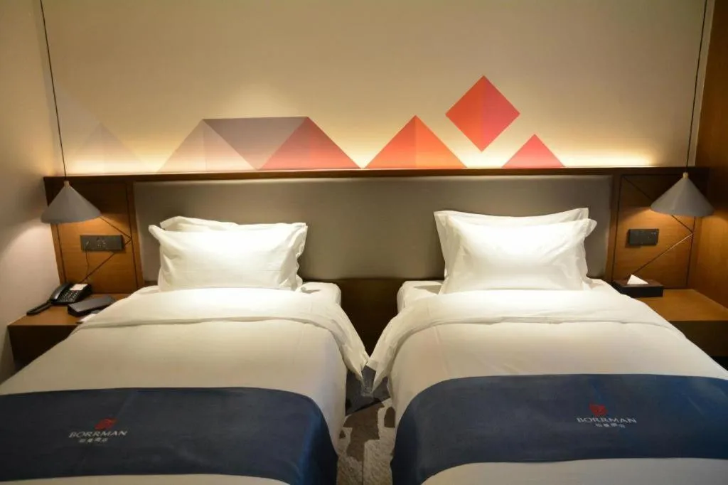 Bed in Borrman Hotel Ji'nan Aoti Center East Provincial Hospital