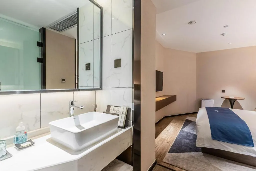 Bed in Borrman Hotel Ji'nan Aoti Center East Provincial Hospital