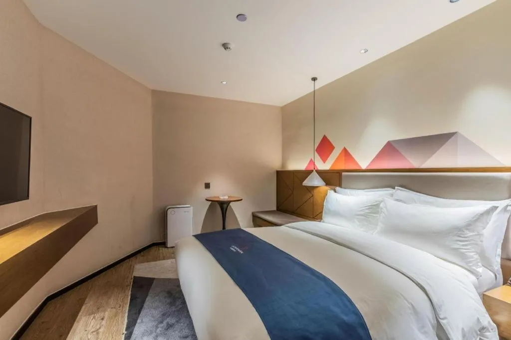 Bed in Borrman Hotel Ji'nan Aoti Center East Provincial Hospital