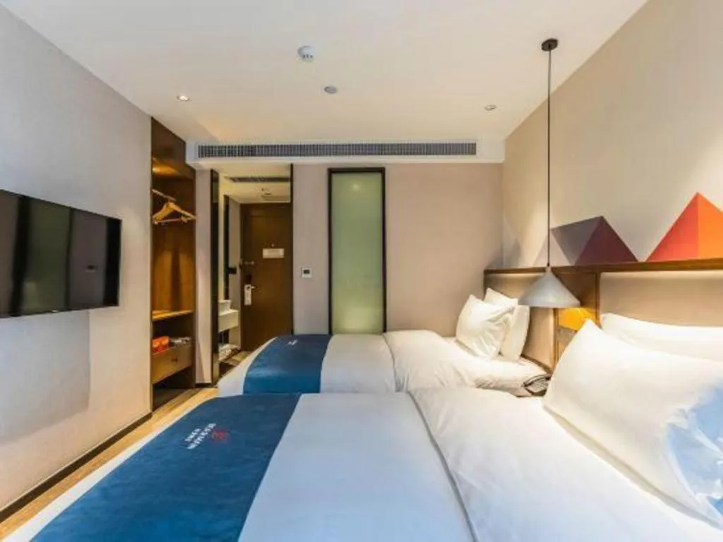 Bed in Borrman Hotel Ji'nan Aoti Center East Provincial Hospital