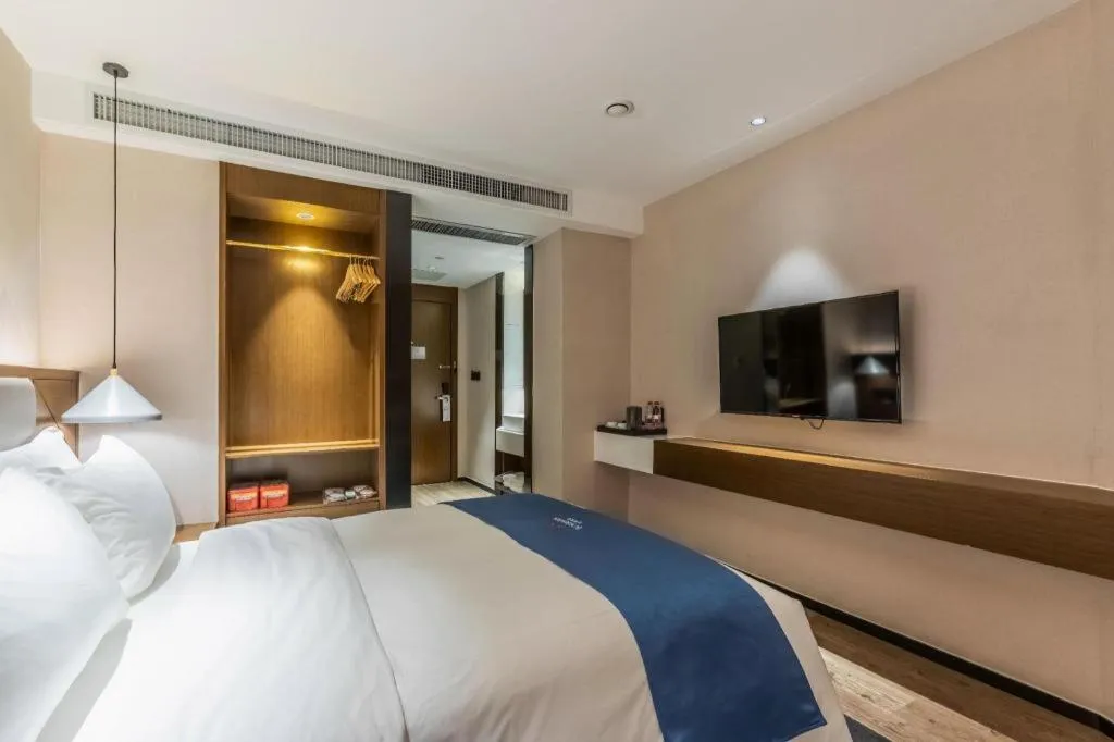 Bed in Borrman Hotel Ji'nan Aoti Center East Provincial Hospital