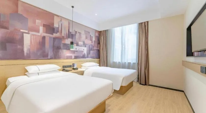 Bed in City Comfort Inn Yangjiang High-tech Zone Pinggang