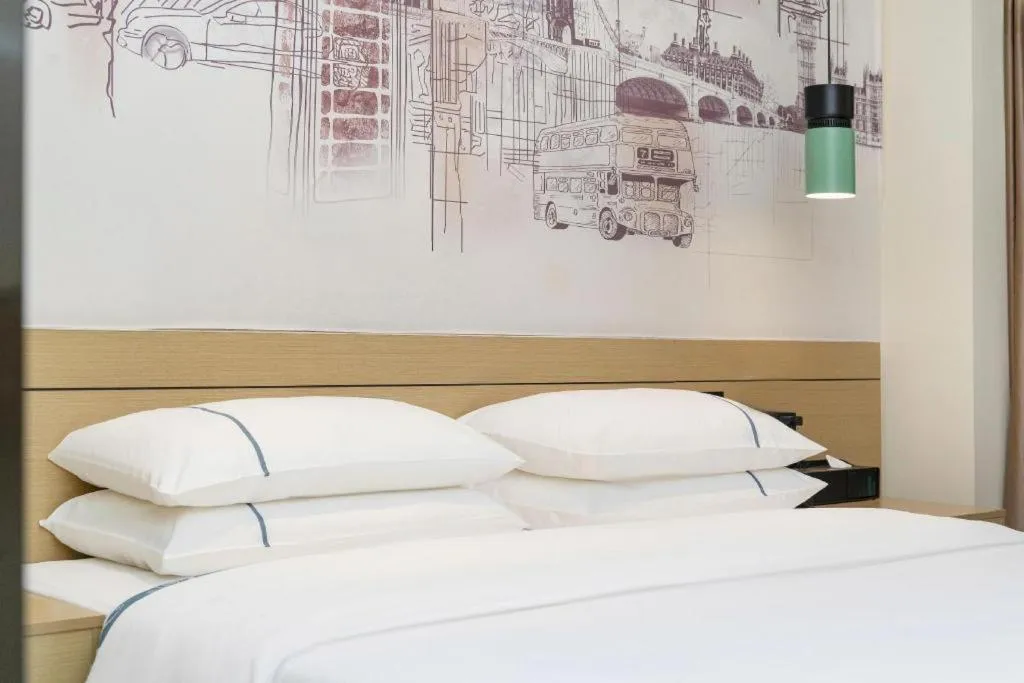 Bed in City Comfort Inn Yangjiang High-tech Zone Pinggang