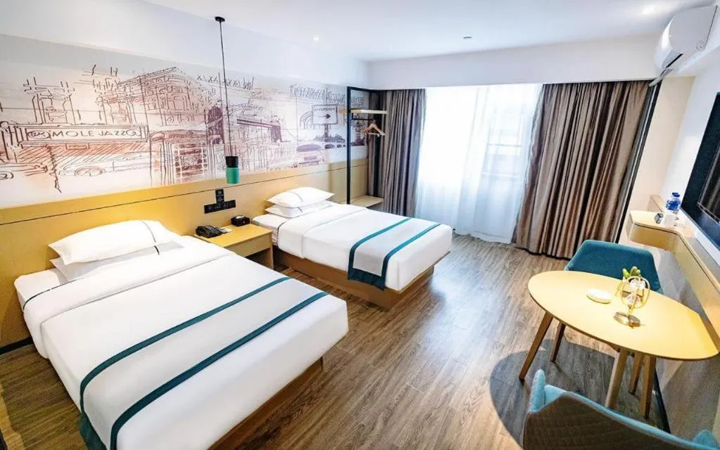 Bed in City Comfort Inn Dali High-speed Railway Station Erhai Park