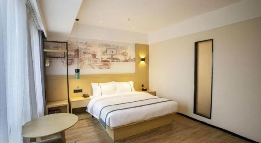 Bed in City Comfort Inn Dali High-speed Railway Station Erhai Park