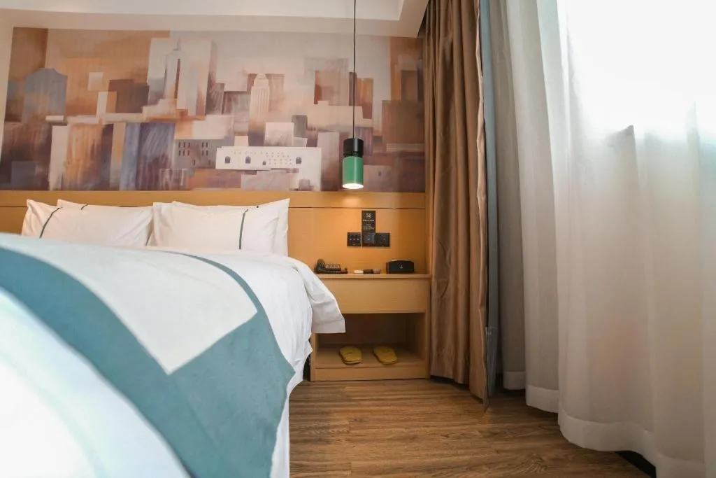 Bed in City Comfort Inn Dali High-speed Railway Station Erhai Park