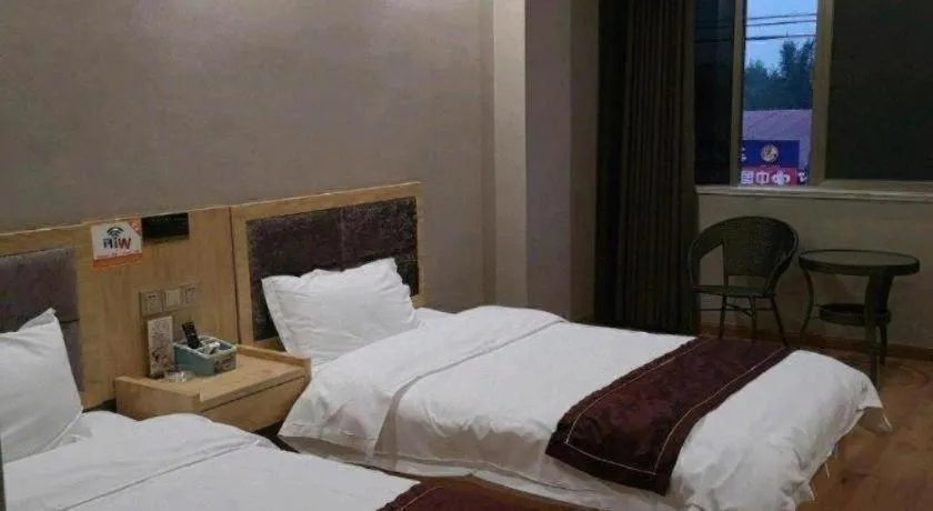 Bed in City Comfort Inn Zhaoqing Sihui Nanjiang Industrial Park