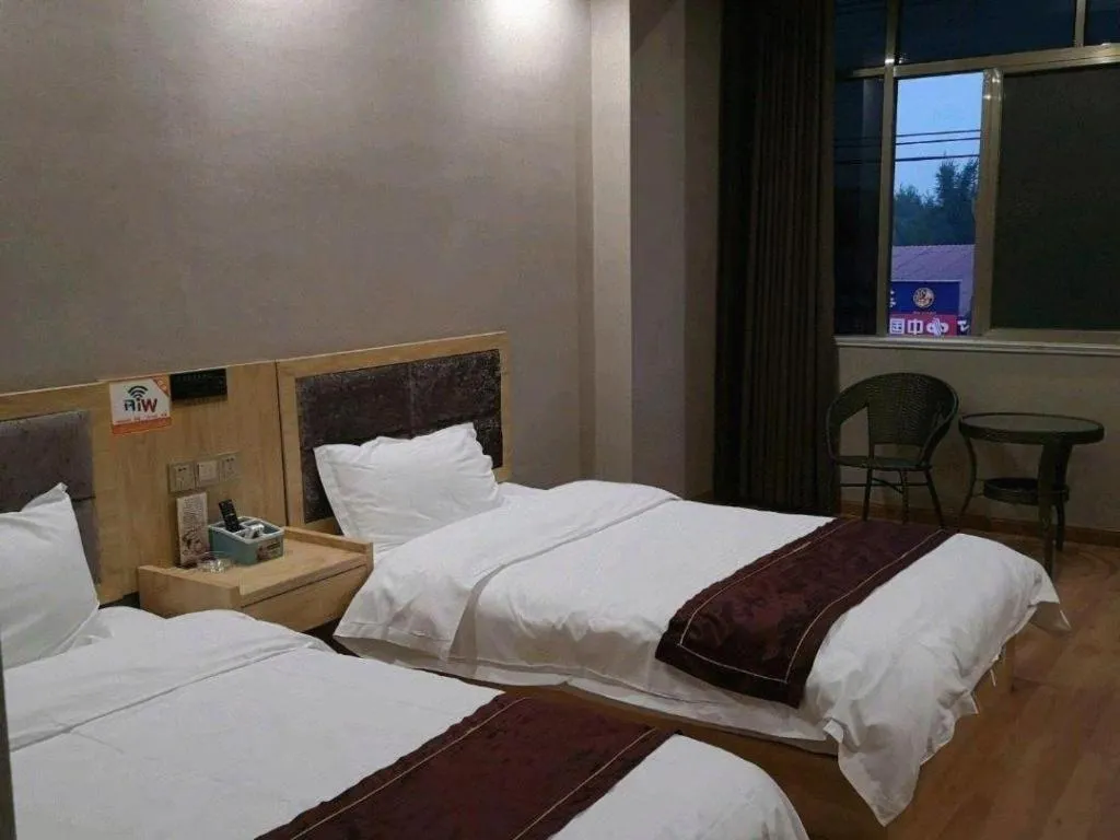 Bed in City Comfort Inn Zhaoqing Sihui Nanjiang Industrial Park