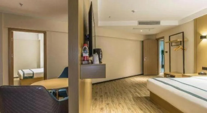 Bed in City Comfort Inn Liuzhou Liucheng