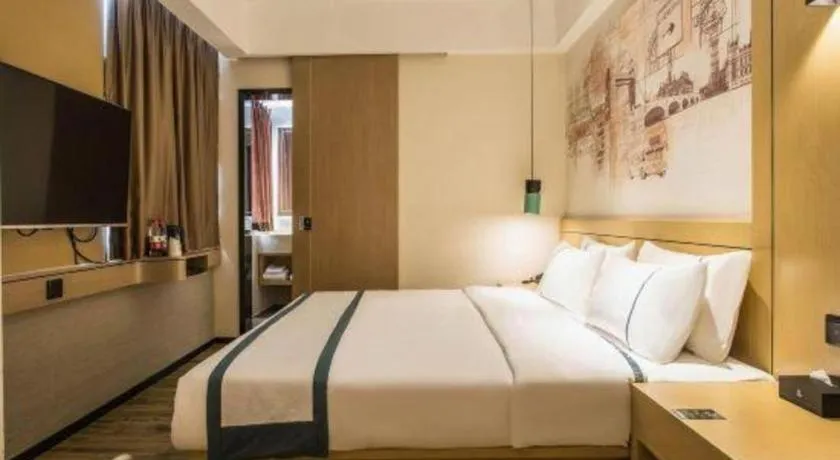 Bed in City Comfort Inn Liuzhou Liucheng