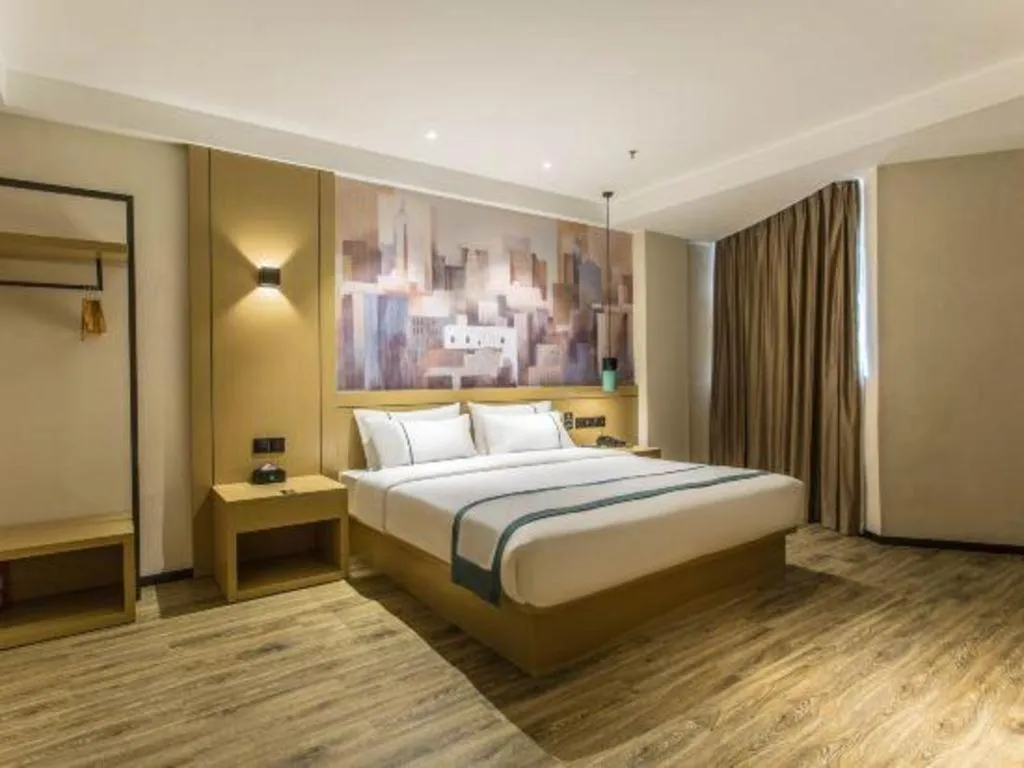 Bed in City Comfort Inn Liuzhou Liucheng