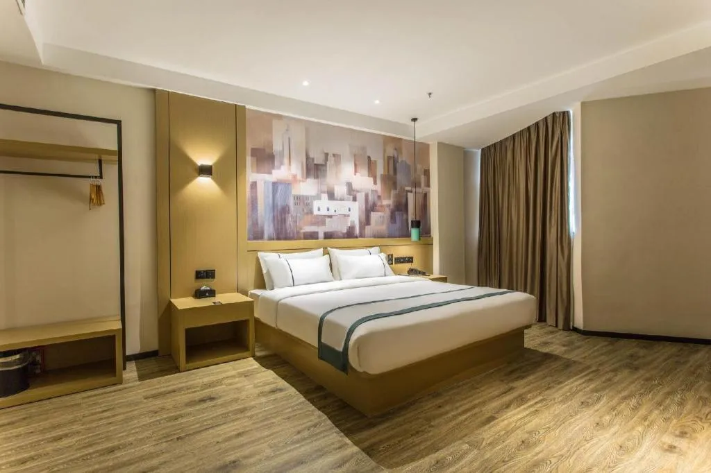 Bed in City Comfort Inn Liuzhou Liucheng