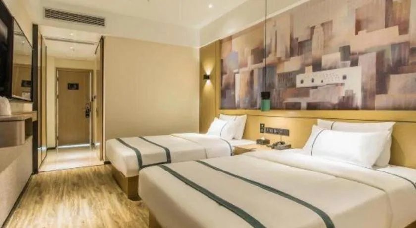 Bed in City Comfort Inn Liuzhou Liucheng