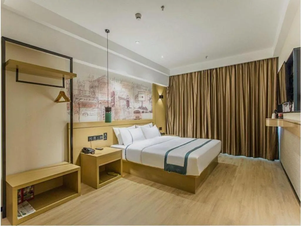 Bed in City Comfort Inn Liuzhou Liucheng
