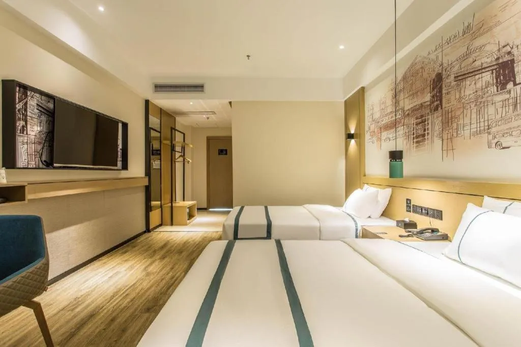 Bed in City Comfort Inn Liuzhou Liucheng