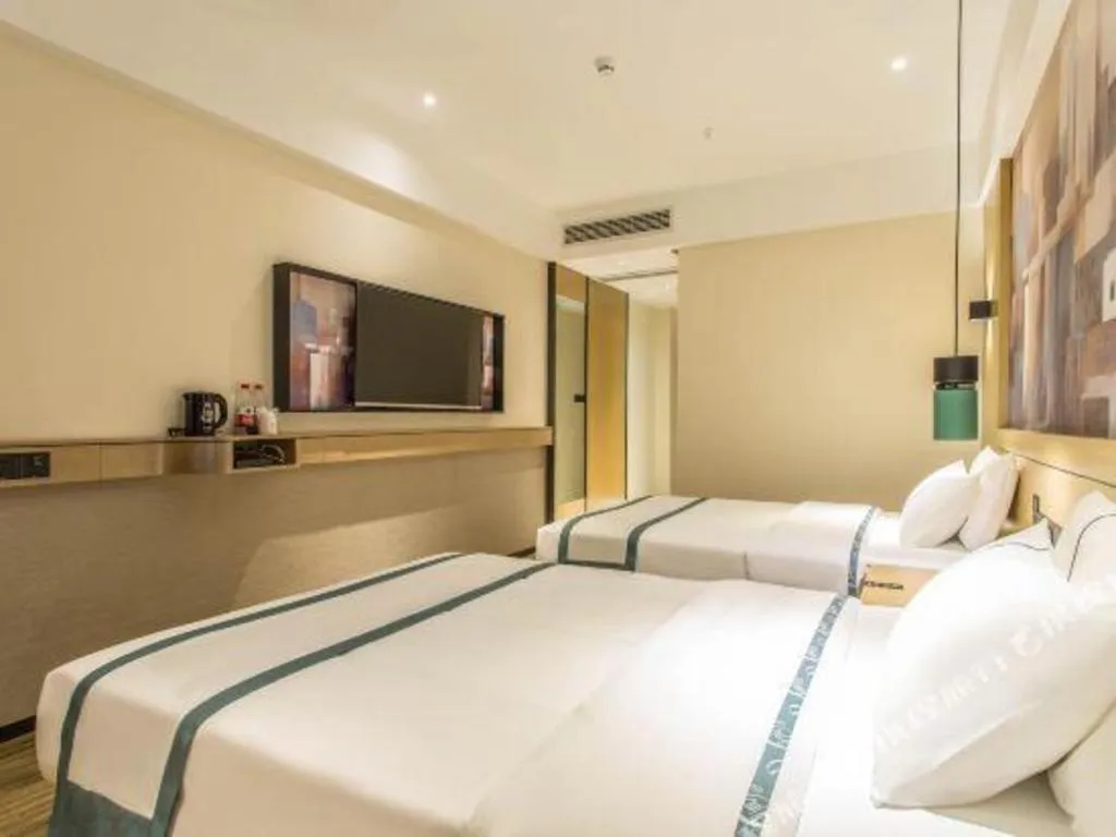 Bed in City Comfort Inn Liuzhou Liucheng