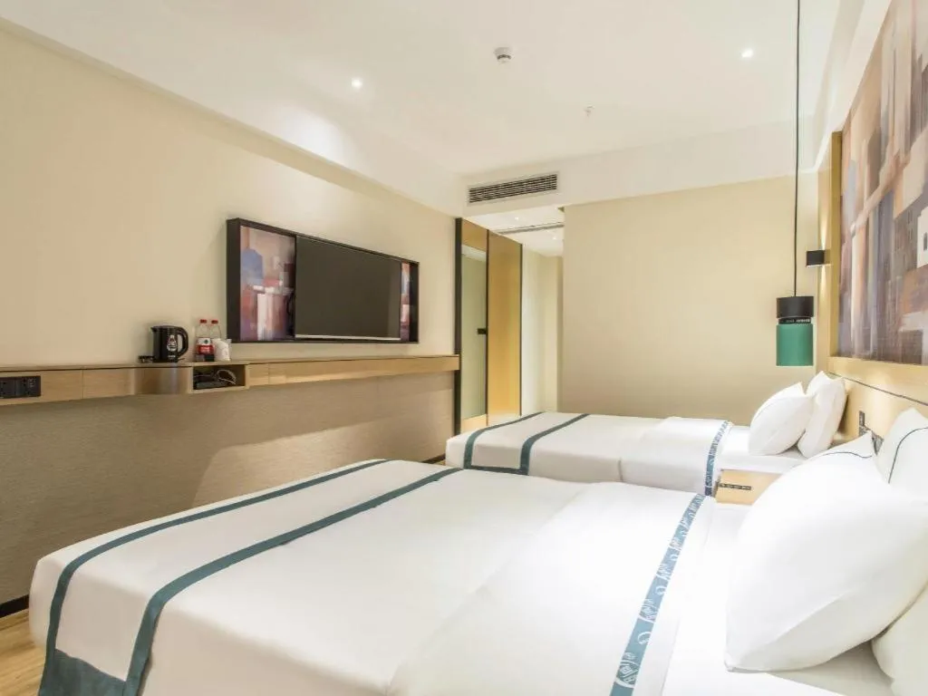 Bed in City Comfort Inn Liuzhou Liucheng