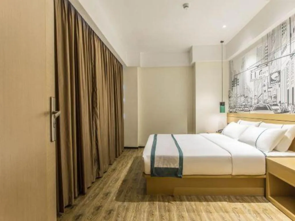 Bed in City Comfort Inn Liuzhou Liucheng
