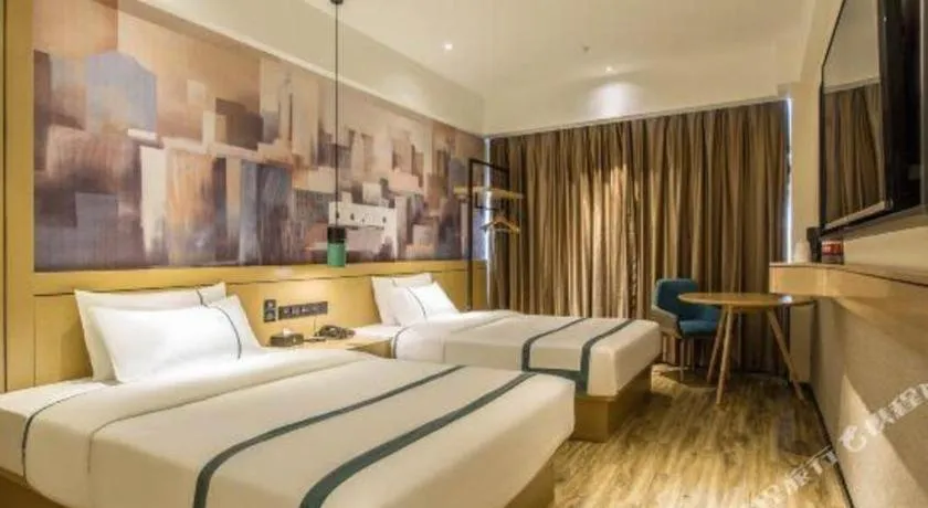 Bed in City Comfort Inn Liuzhou Liucheng