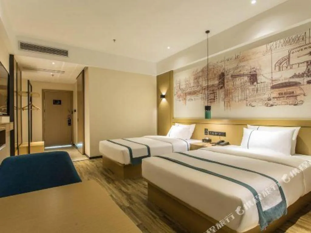 Bed in City Comfort Inn Liuzhou Liucheng