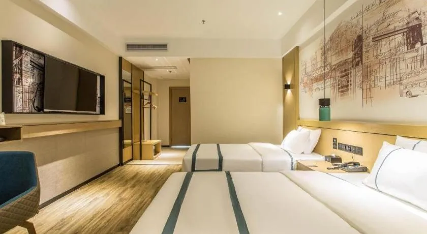 Bed in City Comfort Inn Liuzhou Liucheng