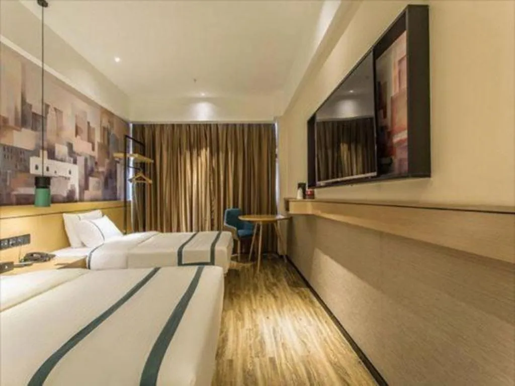 Bed in City Comfort Inn Liuzhou Liucheng