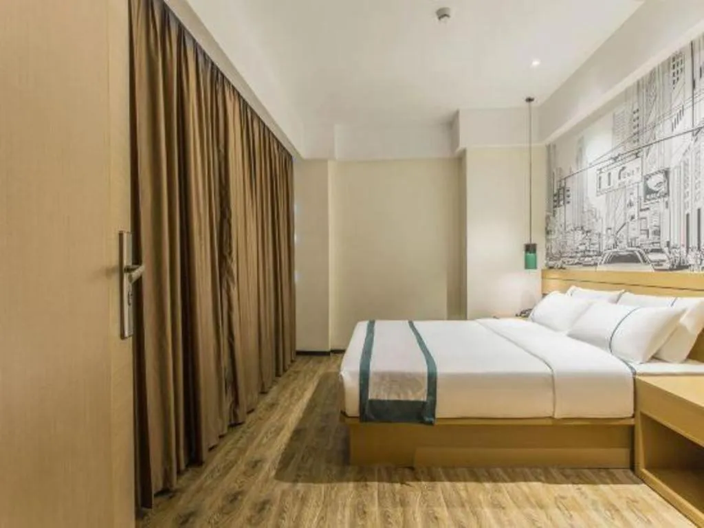 Bed in City Comfort Inn Liuzhou Liucheng