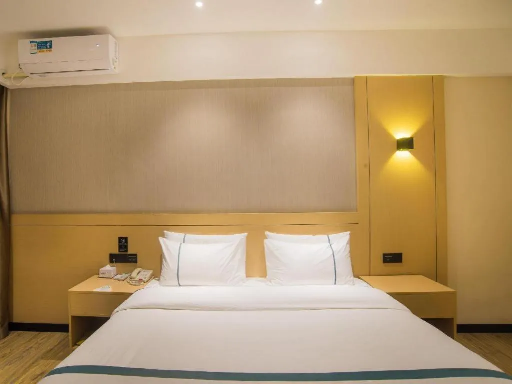 Bed in City Comfort Inn Liuzhou Longtan Park Ma'anshan Baiyun