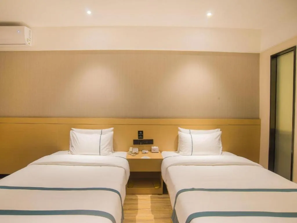 Bed in City Comfort Inn Liuzhou Longtan Park Ma'anshan Baiyun