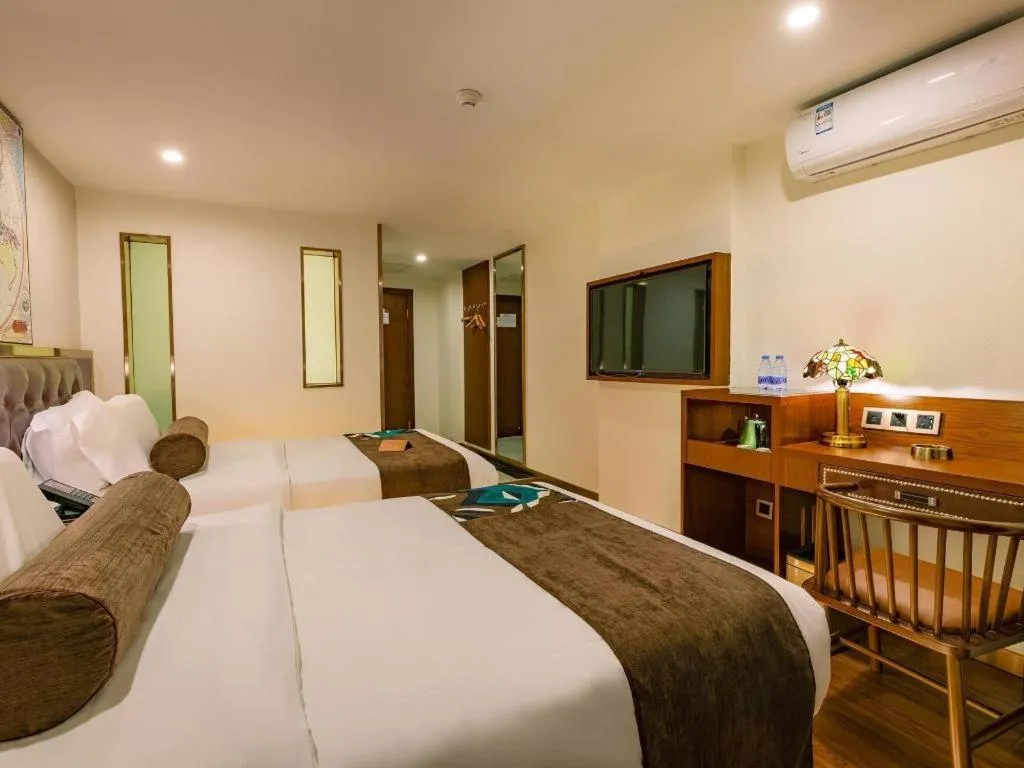 Bed in James Joyce Coffetel Guilin Railway Station Xiangbi Mountain Liangjiang Sihu Wharf