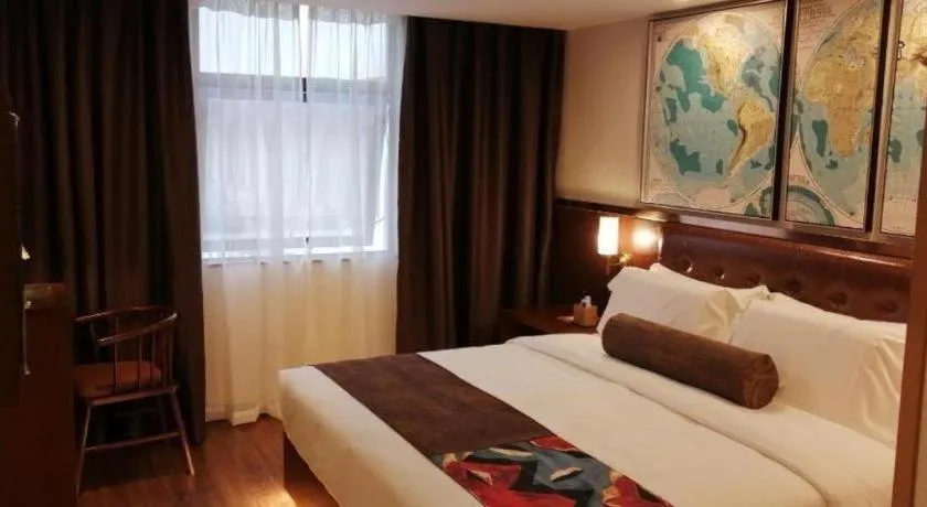 Bed in James Joyce Coffetel Guilin Railway Station Xiangbi Mountain Liangjiang Sihu Wharf