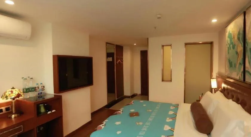 Bed in James Joyce Coffetel Guilin Railway Station Xiangbi Mountain Liangjiang Sihu Wharf