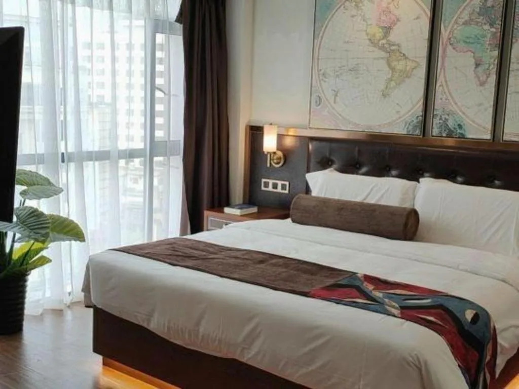 Bed in James Joyce Coffetel Guilin Railway Station Xiangbi Mountain Liangjiang Sihu Wharf