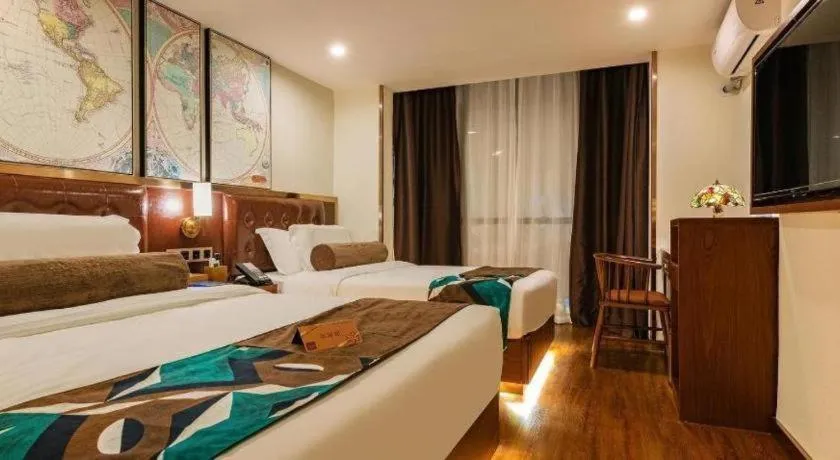 Bed in James Joyce Coffetel Guilin Railway Station Xiangbi Mountain Liangjiang Sihu Wharf