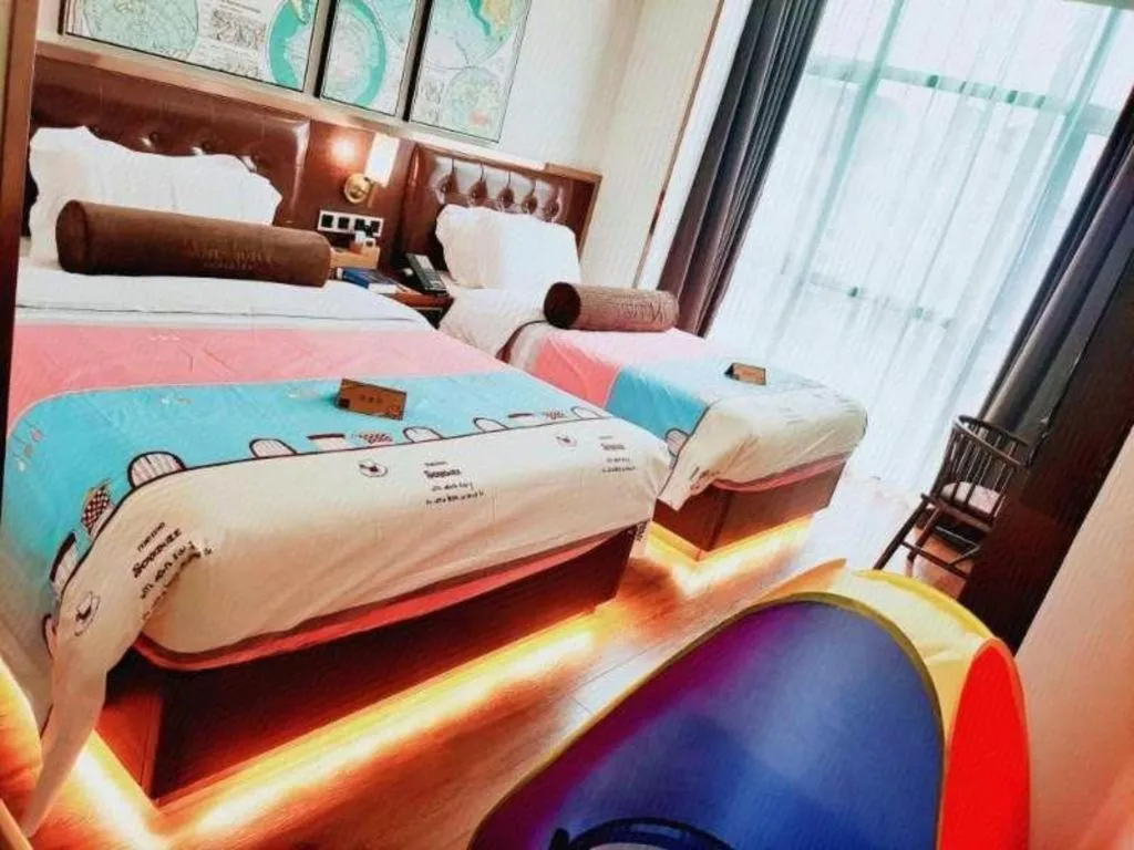 Bed in James Joyce Coffetel Guilin Railway Station Xiangbi Mountain Liangjiang Sihu Wharf